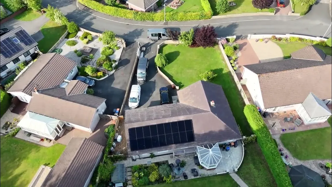 Solar panels viewed from above in a Cumbrian neighbourhood